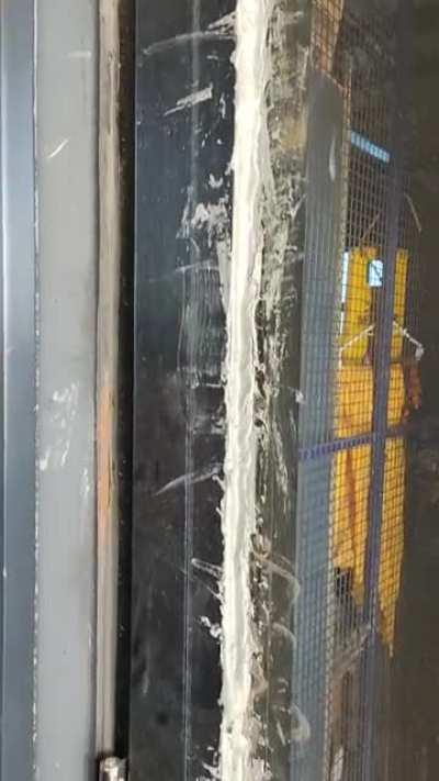 Put silicone sealant on this glass door...