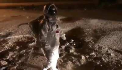 Indian man protesting potholes in an interesting way