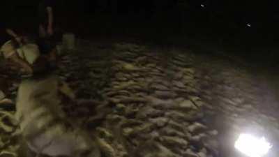 Jumping through a ring of fire in Thailand