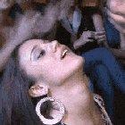 Letting a male stripper jizz all over her face