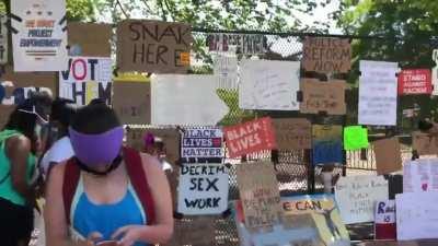 People have converted the fence outside the White House into a memorial wall for black men and women who have lost their lives at the hands of police.
