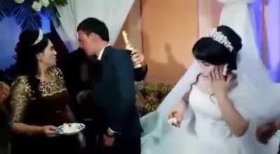 POS Groom unnecessarily slaps bride over a cake bite