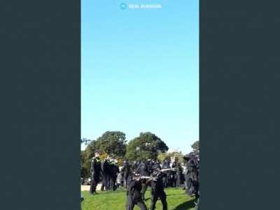 Police in Australia opens fire on peaceful protestors.