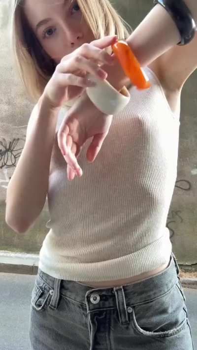 Blonde Bella in white sleeveless turtleneck top 🤍