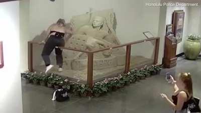 Destroying a sand sculpture