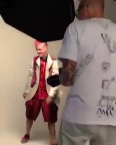 Jocelyn Flores playing in the background during Peep's photoshoot