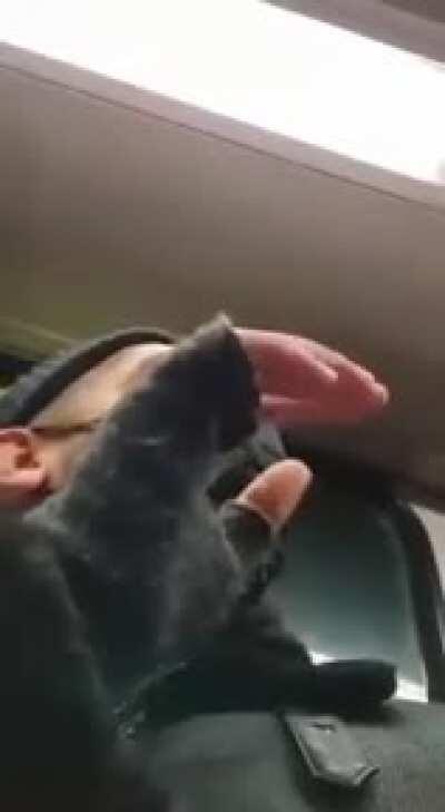 A racist woman rants at an Asian man on a bus, calling him a terrorist because he's Asian. The bus is silent. He tells her to get off the bus. Everyone turns against him. FUCK this contry.