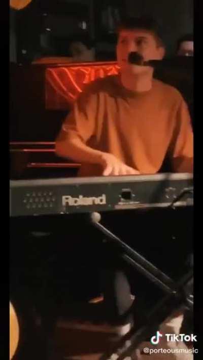 Guy has a cranking piano solo at a live gig