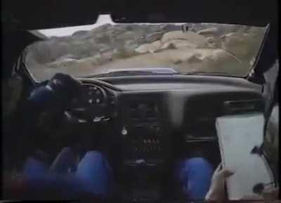 Colin McRae and co-driver repair suspension mid-race with a rock