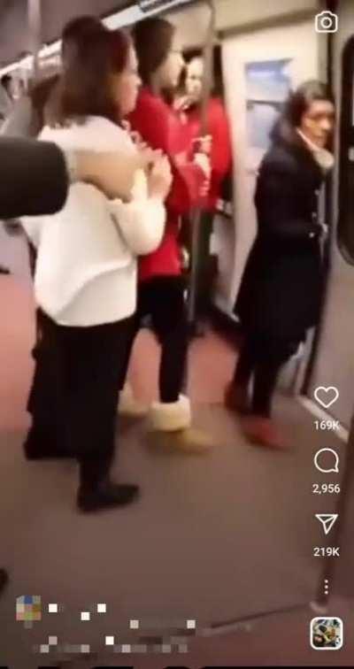 I think he wants to tell the conductor that he has a problem