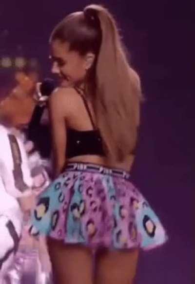Ariana Grande and her cute butt in a perfect outfit.