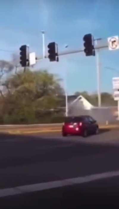 Car launches off curb into house