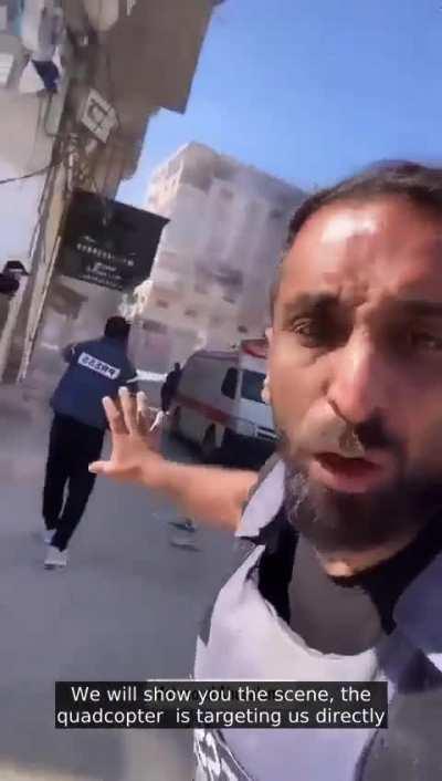'Israeli' quadcopters are directly shooting at journalists covering the 'Israeli' aggression against Jabalia refugee camp. They've been violently bombing Jabalia refugee camp for days now and have a history of committing massacres there.