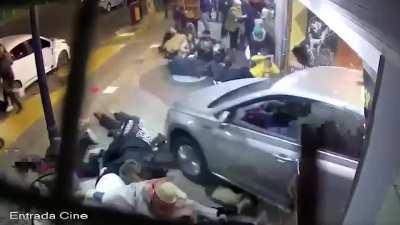 Disabled driver reversing into a crowd of people