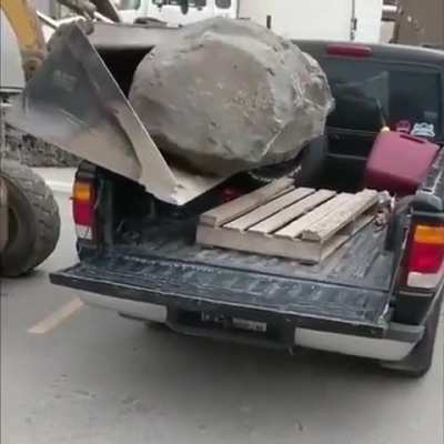 Yeah, put that huge boulder on the back of my pickup