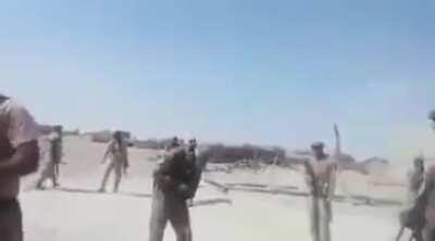 Pakistani paramilitary soldiers kill a suspected Taliban suicide bomber. [Not for the faint hearted]