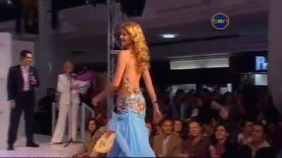 to model a skirt by Miss Universe