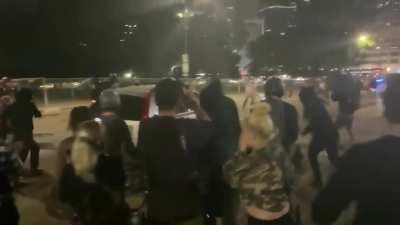 Car drives through protesters after they block and start attacking - Denver 23rd September