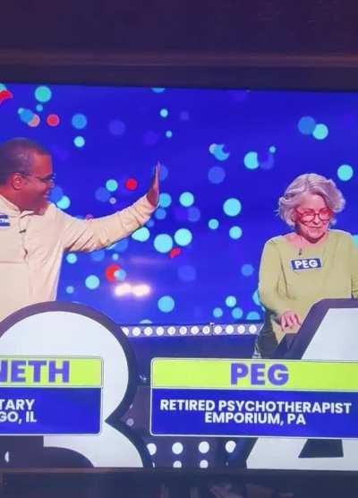To give a high five on a game show.