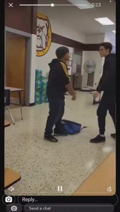 Kid with hat was bullying tall kid for being a freshman