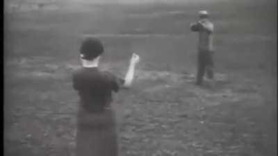 This silent footage, shot in 1932, shows a man testing an early version of bulletproof glass by having his wife hold the glass to her face while he fires towards her.