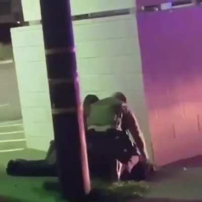 I'm on the ground! Screamed a man before police in Compton CA beat him.