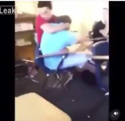 Liveleak footage of a kid using a desk as a weapon