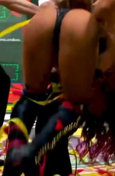 Toni trying to hit a Piledriver on Mercedes Moné