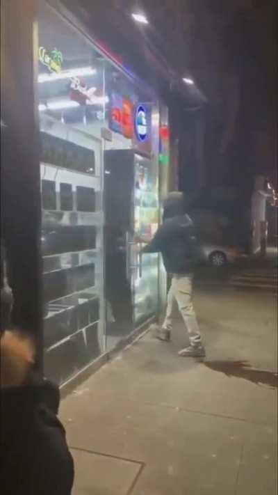 Trying to break open a glass door