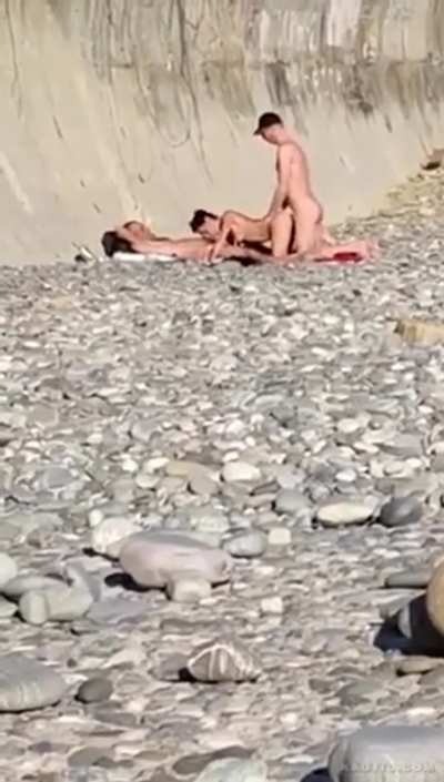 Threesome on a rocky beach
