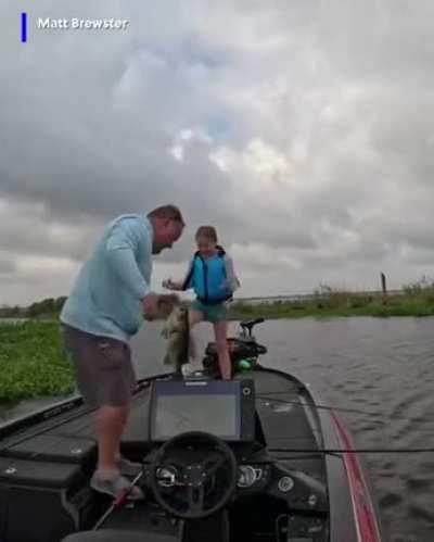 Girl makes big catch on 1st fishing trip with dad