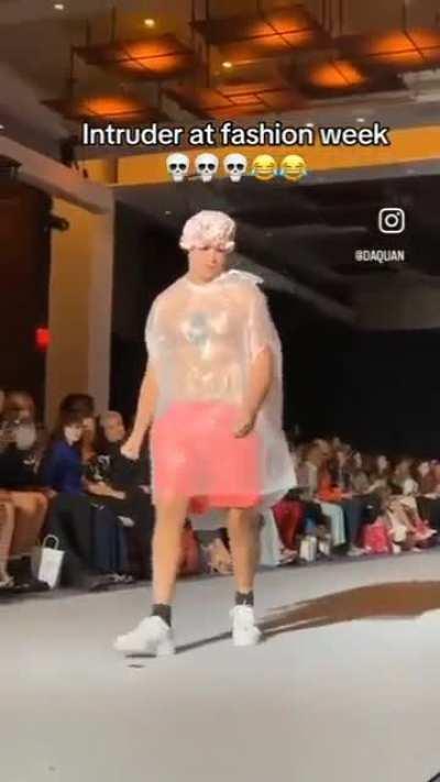 Dude snuck into a fashion show wearing a trash bag