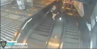 Man Kicks Woman Down Escalator