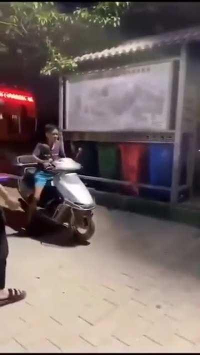 Driving the moped up a truck ramp, what could go wrong?