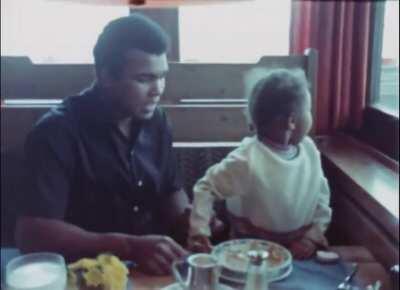 Muhammad Ali sees a big old dog.