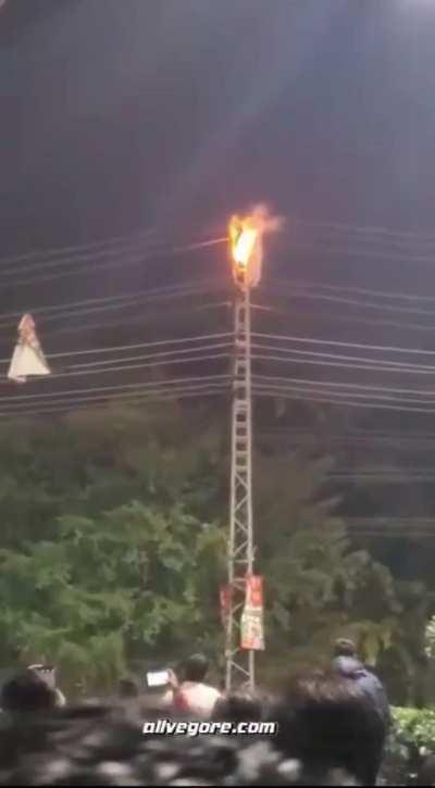 Man climbed the electric pole to get the kite and of course was electrocuted. India