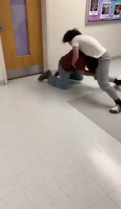 Bully tries to sucker punch a kid and shits himself mid-fight