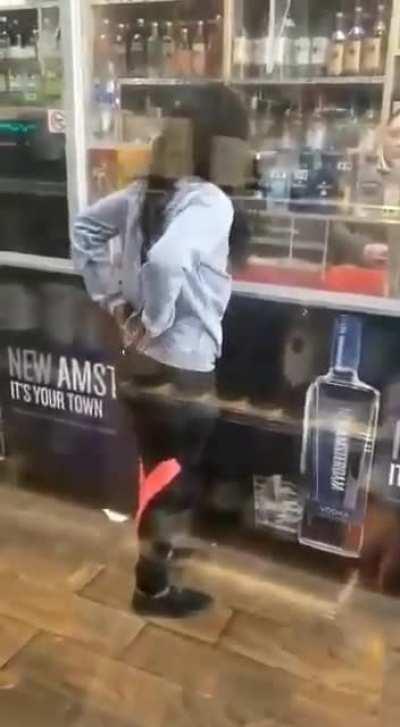 Woman pisses all over floor