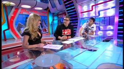 Anna Simon playing with her shirt buttons