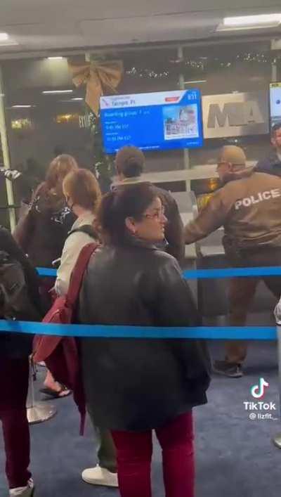 Drunk woman has an airport meltdown