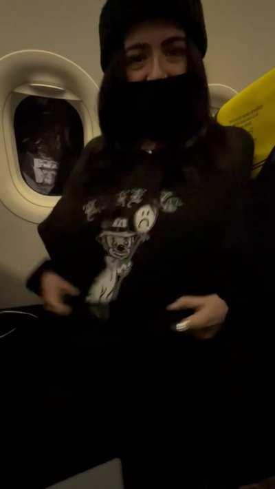 Risky airplane titty drop