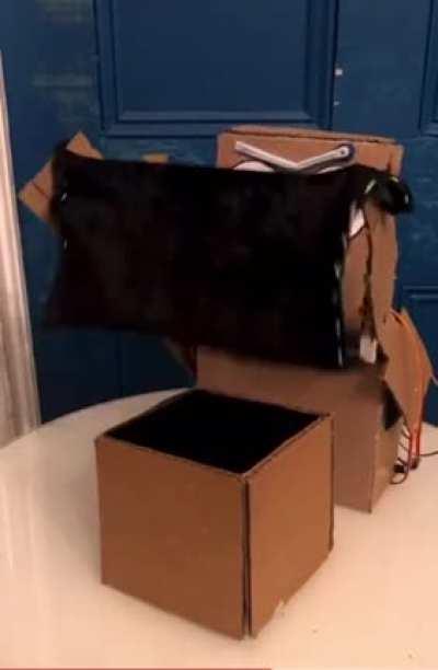 Robot programmed to do magic tricks