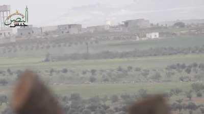 FSA destroy a moving SAA BMP with a TOW missile.Hama, Syria 2017.