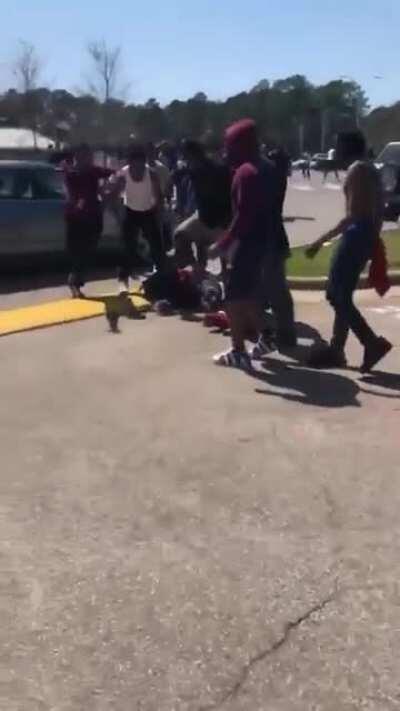 High school brawl! Ends really bad for one student!