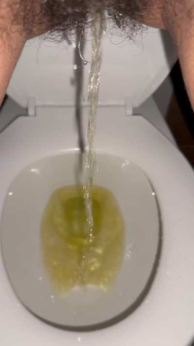 Taking a long piss, wish it was on your face