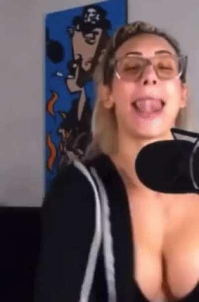 Carmella shaking her boobs