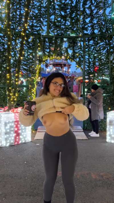 Flashing my perky tits at the Christmas festival!