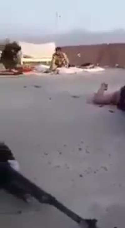 Iraqi volunteer gets his head snapped by isis sniper the moment he tries to fire his pkm, exact date/location are unknown.