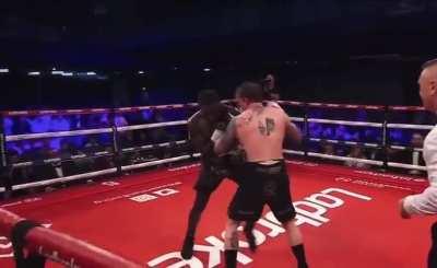 Boxer knocked out on his feet. Samuel Antwi knocks out Mason Cartwright in the twelfth round of their fight.