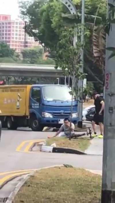 Truck driver tries to run over cyclist and soon realizes he chose the wrong guy to f with